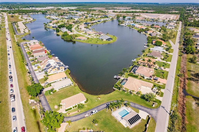 bird's eye view with a water view