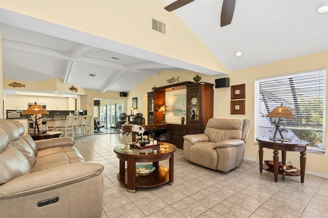 living room with vaulted ceiling with beams, light tile floors, and ceiling fan