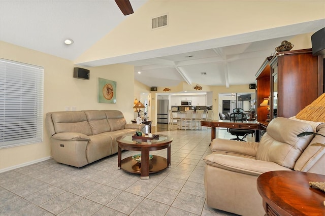 tiled living room featuring lofted ceiling with beams