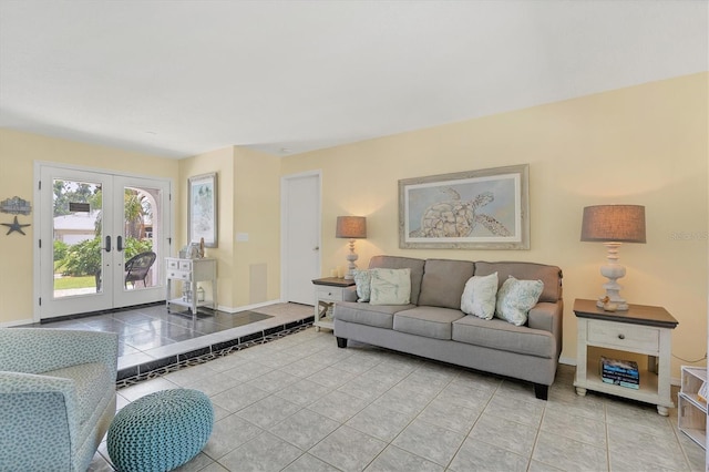 living room with french doors and light tile flooring