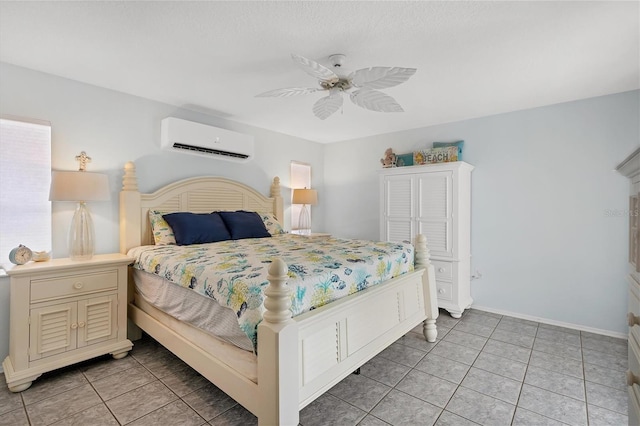 bedroom featuring a wall unit AC, ceiling fan, and light tile flooring