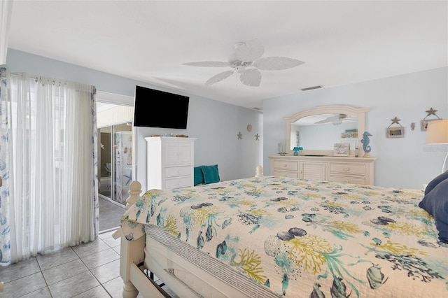 bedroom with ceiling fan and light tile floors