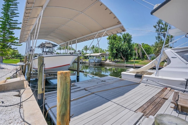 dock area with a water view