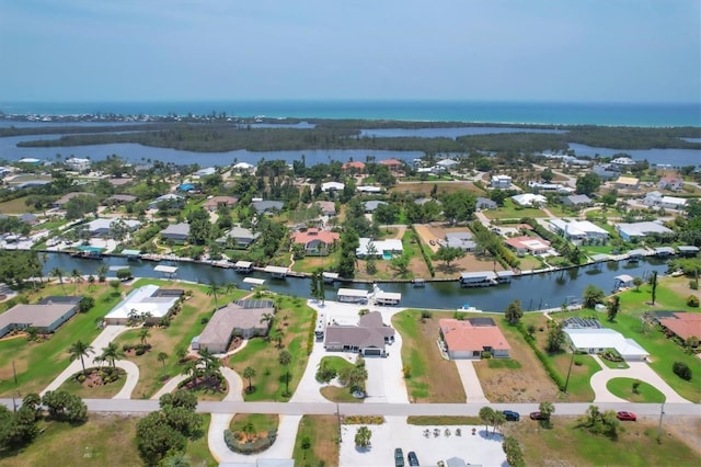 bird's eye view with a water view