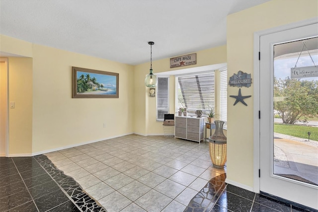 dining area featuring tile floors