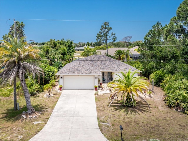 view of front of property featuring a garage