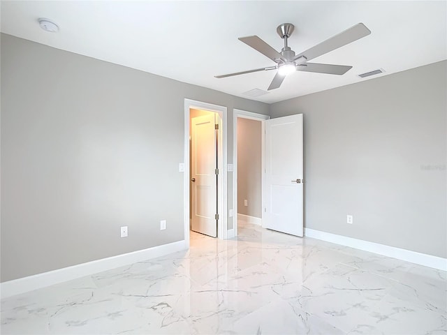 spare room featuring ceiling fan