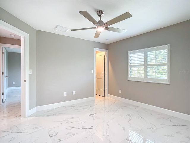 unfurnished bedroom featuring ceiling fan