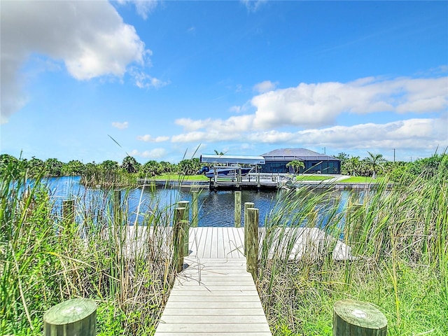 view of dock with a water view