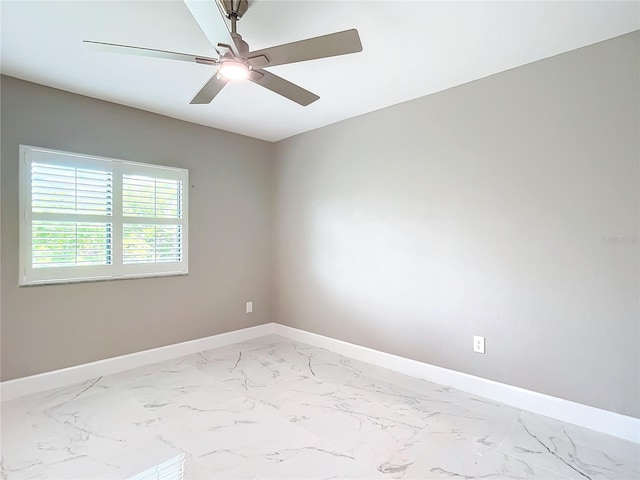 unfurnished room with ceiling fan