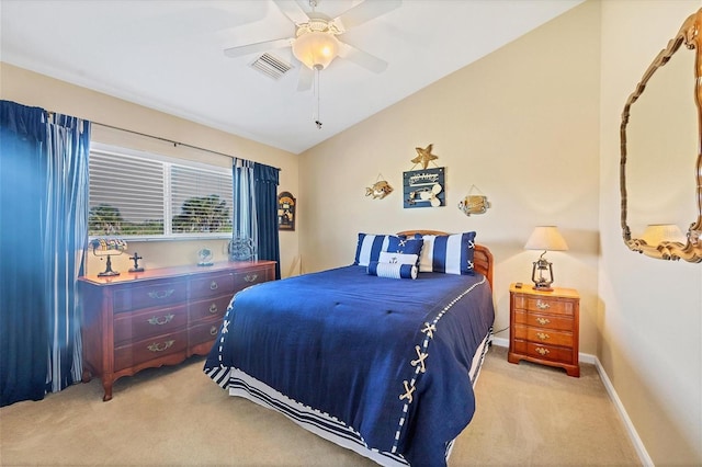 carpeted bedroom featuring ceiling fan and lofted ceiling