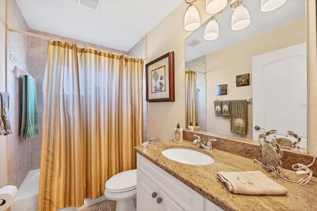 full bathroom with vanity, toilet, and shower / tub combo with curtain