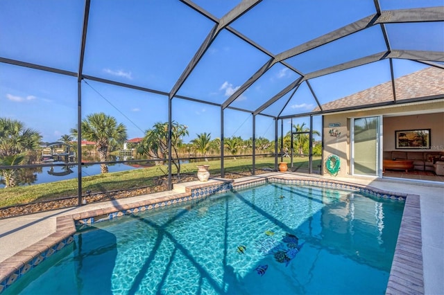 view of pool featuring a lanai and a water view