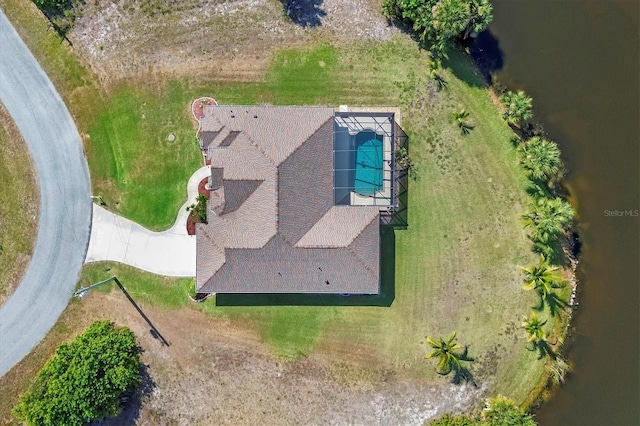 drone / aerial view with a water view