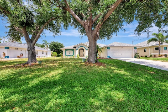 ranch-style house with a garage and a front lawn