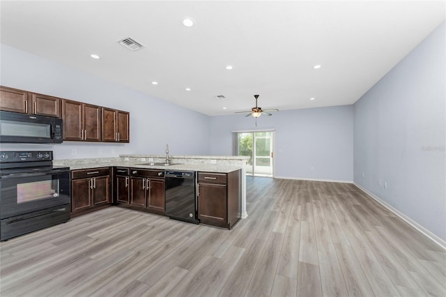 kitchen featuring sink, light hardwood / wood-style flooring, ceiling fan, dark brown cabinetry, and black appliances