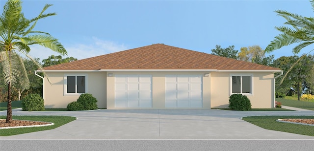 view of front of house with a garage, concrete driveway, a shingled roof, and stucco siding