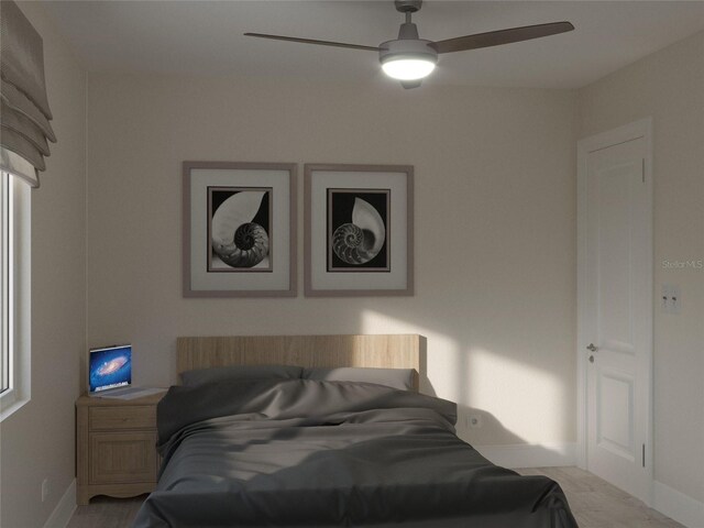 carpeted bedroom with ceiling fan