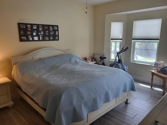 bedroom featuring dark hardwood / wood-style floors