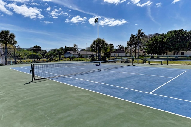 view of tennis court with basketball court