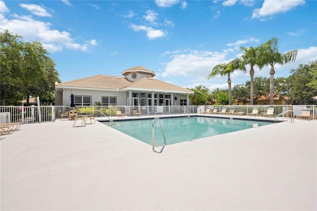 view of pool featuring a patio area