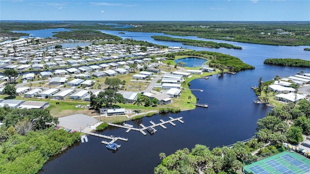 bird's eye view featuring a water view and a residential view