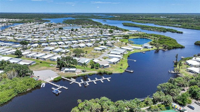 bird's eye view featuring a water view and a residential view