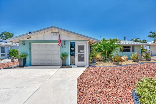 single story home with a garage