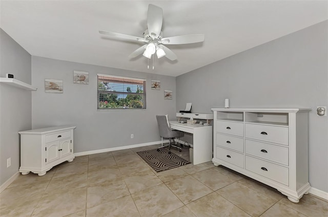 tiled home office featuring ceiling fan