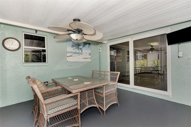 sunroom / solarium featuring wooden ceiling