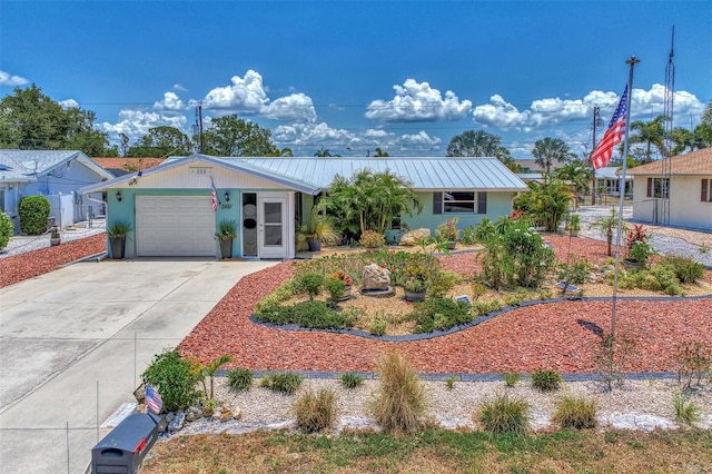 single story home featuring a garage