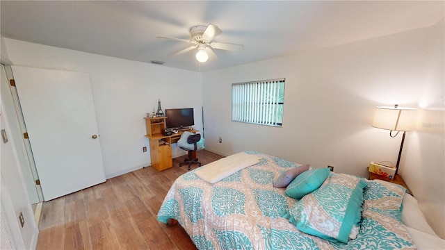 bedroom featuring ceiling fan and light wood-type flooring