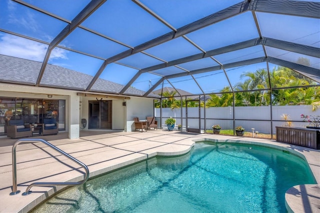 view of pool featuring a patio and a lanai