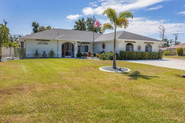 ranch-style home featuring a front yard