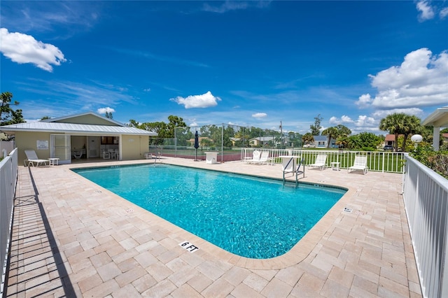 view of pool with a patio