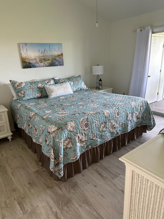 bedroom featuring hardwood / wood-style floors