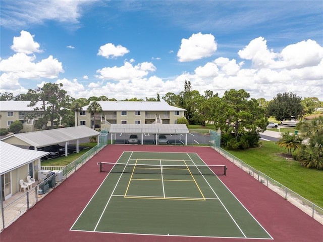 view of sport court with basketball hoop