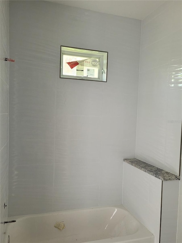 bathroom featuring tub / shower combination