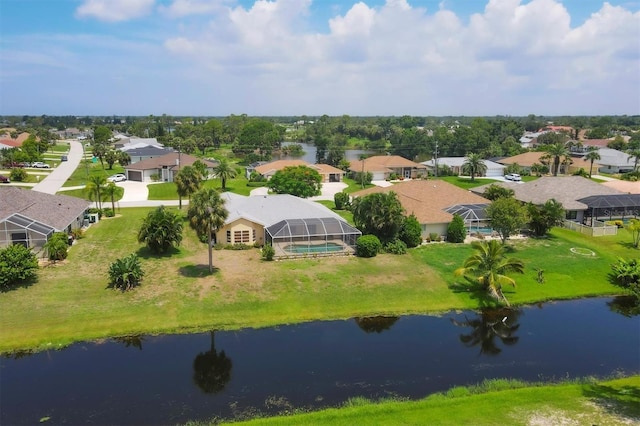 drone / aerial view with a water view