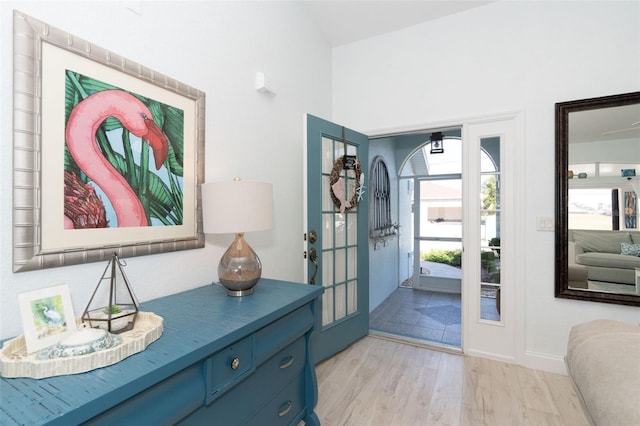 entryway with light hardwood / wood-style floors