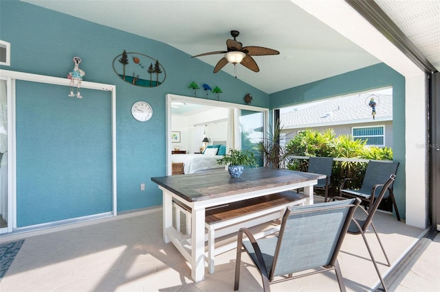 interior space with ceiling fan