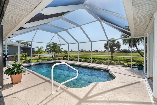 view of pool featuring a lanai and a patio