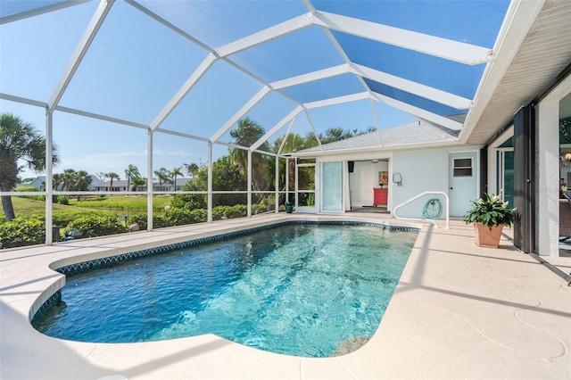 view of pool featuring a lanai and a patio area