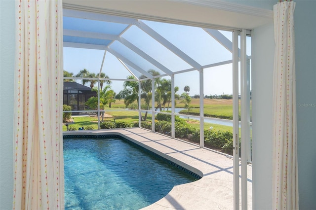 view of pool featuring a lanai and a patio