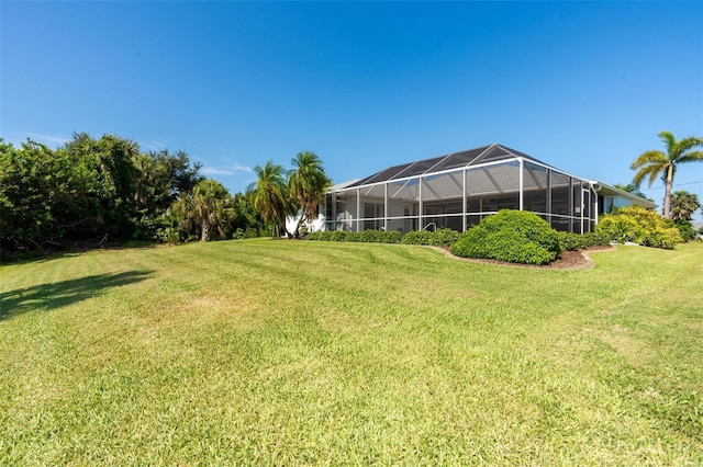 view of yard featuring a lanai