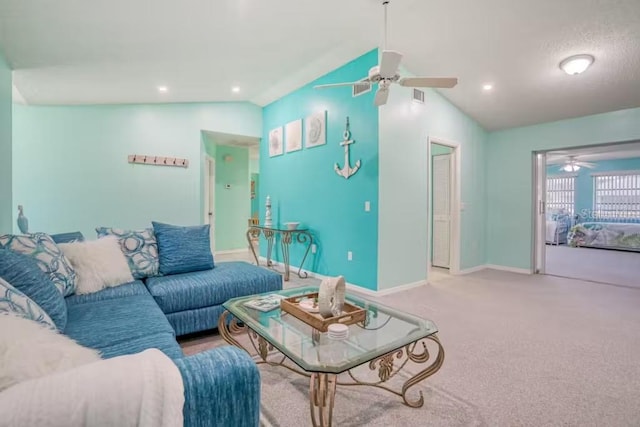 carpeted living room featuring lofted ceiling