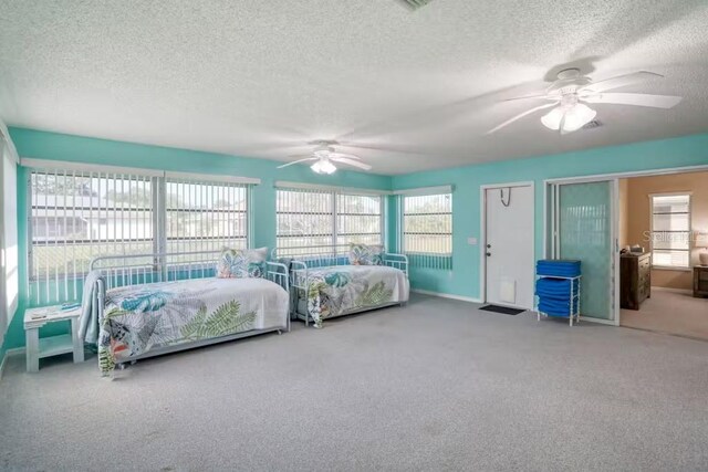 bedroom featuring carpet flooring and ceiling fan