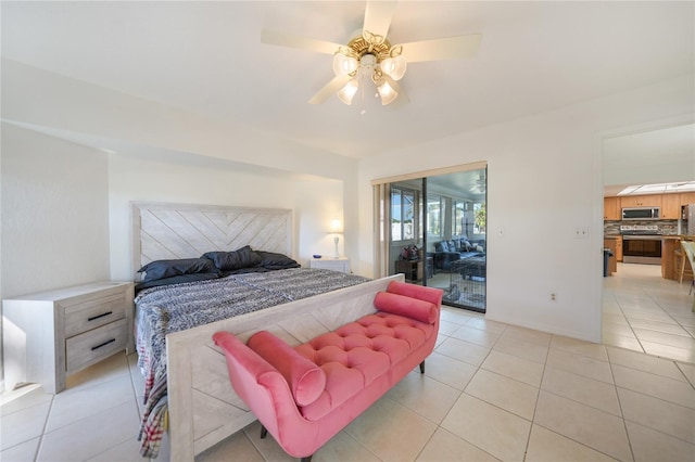 bedroom with ceiling fan, access to exterior, and light tile patterned floors