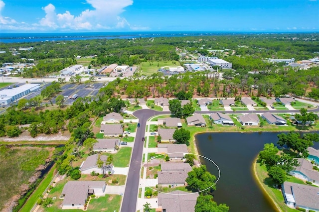 drone / aerial view with a water view