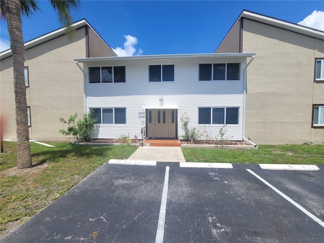22481 Westchester Blvd Unit B40, Punta Gorda, FL 33980 - multi unit property featuring uncovered parking and stucco siding